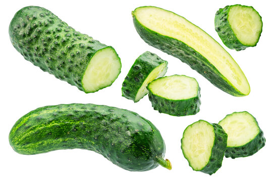Longitudinal and cross section slices of cucumbers isolated on white background. File contains clipping path.