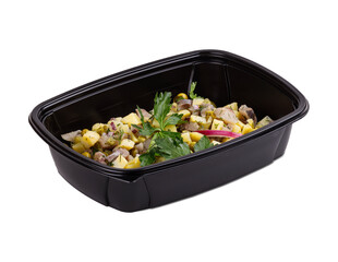 A black plastic container filled with assorted food items