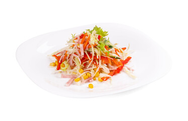 A white plate with a vegetable salad on a white background