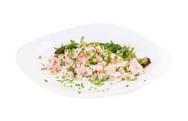 A white plate topped with a fresh salad on a white background