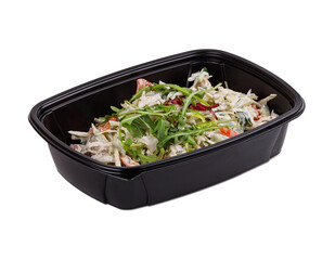A black container filled with salad on a white background