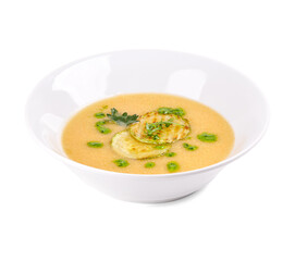 A bowl of warm soup with fresh green onions on a white background