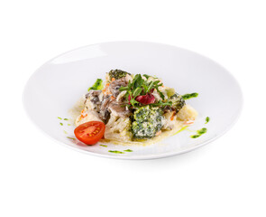 A white plate with broccoli and tomatoes on a white background