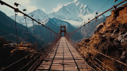 Fototapeta premium Suspension Bridge Over Mountains