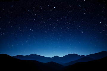 Obraz premium A serene night sky filled with stars over a silhouette of mountains. The main colors are deep blue and black.