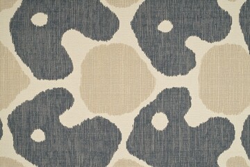 Abstract fabric pattern in navy, beige, and off-white tones