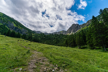 Fototapeta premium Mountain landscape view with hiking path in Allgau region of Bavaria Germany