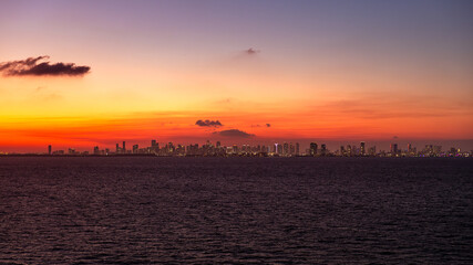 Beautiful skyline of Miami in Florida during sunset with purple clouds