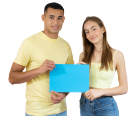 Young diverse couple holding together a blue paper wearing casual clothes standing isolated over transparent background. PNG transparent