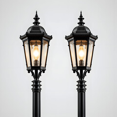 Antique streetlamp with retro metal post and glass lantern illuminated at night under the blue sky in a city