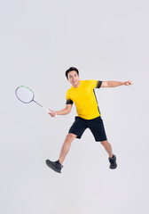 Portrait of Asian man playing badminton on white background.