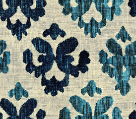 Bright turquoise and deep indigo floral pattern on fabric, Seamless Pattern Style.