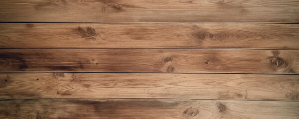 Top-down view of a rustic wooden surface with weathered textures and warm brown tones. The aged wood planks have a natural, distressed look, making this background perfect for vintage designs.