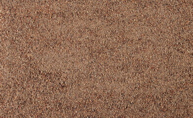Ground carob background and texture	