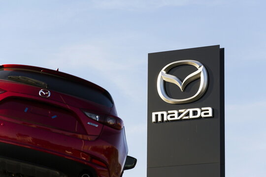 PRAGUE, CZECH REPUBLIC - MARCH 31: Mazda 3 car in front of dealership building on March 31, 2017 in Prague, Czech republic. Mazda set to launch new electric vehicle range by 2019.