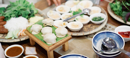 Panorama view authentic Hue cuisine dinner set of popular Banh Beo or Bloating Fern-shaped cake...