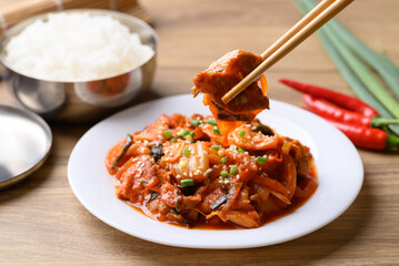 Stir fried kimchi cabbage with pork eating with cooked rice, Korean food