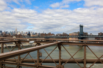 Fototapeta premium NEW YORK CITY-APRIL 23, 2014: New York city architecture and Manhattan view from Brooklyn Bridge