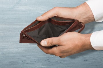 Poor people, empty wallet in the hands