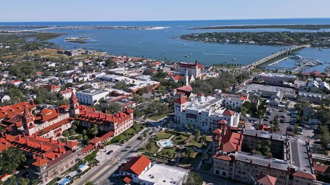 Flying North over historic St. Augustine, Florida and looking East at mid-morning