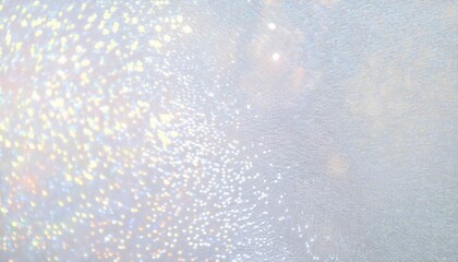 shimmering abstract bokeh light effect with soft pastel colors on textured background for creative design or photography use
