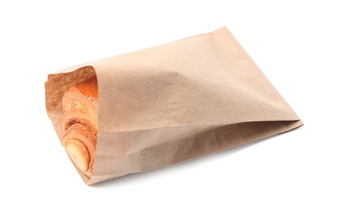Paper bag with freshly baked bun isolated on white