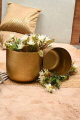 A vibrant vase filled with flowering. Flowers in a metal vase. 