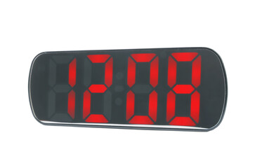 Digital alarm clock showing 12:08 o'clock on white background
