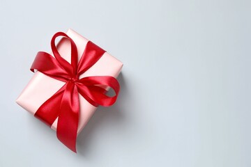 Beautiful gift box on gray background