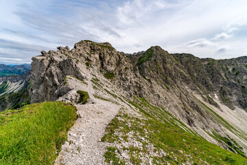 Mountain Trail Leading to Summit with Scenic View of Alps in Bavaria near Bad Hindelang