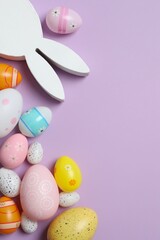 Happy Easter. Colorful eggs and bunny ears on color background, space for text or advertising