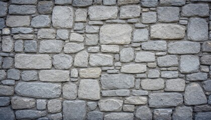 Aged gray stone wall, seamless texture background