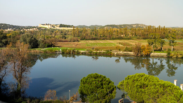 View of a medieval castle across the river Rhone in Avignon France