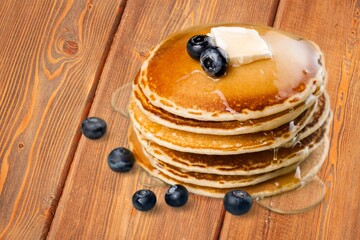 Stack of traditional tasty pancakes on plate