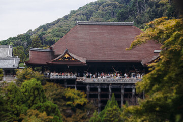 Kiyomizu-dera buddhist temple in Kyoto prefecture, Japan, Higashiyama ward, autumn fall view with mountains, Kyoto streets and skyline, shrine and pagoda, travel to Japan, Kansai region