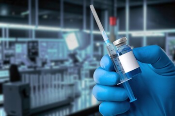 vaccine in a vial in hands, treatment of infection
