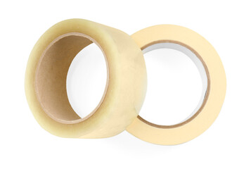 Rolls of adhesive and masking tapes isolated on white, top view