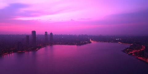 Fototapeta premium A vibrant purple sky envelops a cityscape, showcasing a river flowing gracefully beneath a striking bridge, creating a serene urban vista.