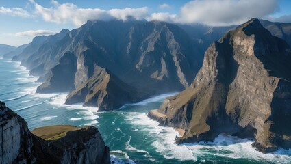 Coastal cliffs with rugged mountains and crashing waves under a partly cloudy sky at sunrise or sunset