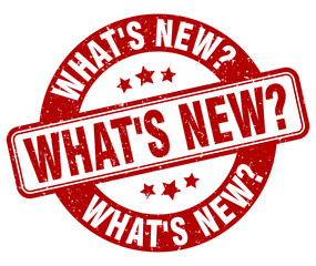 what's new? stamp. what's new? label. round grunge sign