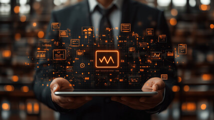 businessman in suit holds tablet displaying digital data and graphs in high tech environment, showcasing innovation and technology