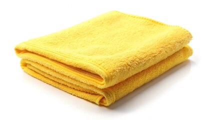 Folded yellow towel on white background soft texture ideal for kitchen or cleaning purposes premium quality textile product
