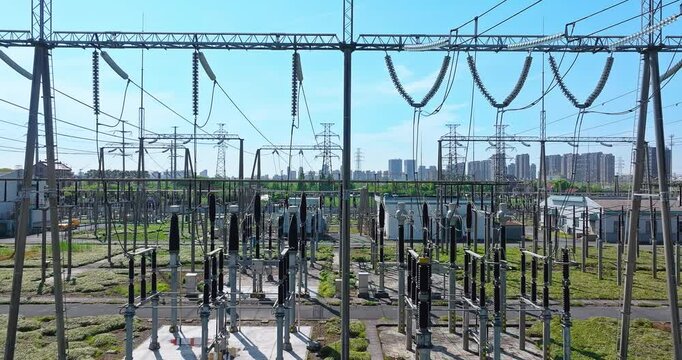 Aerial view of electrical substation and power plant in modern city