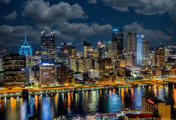 Pittsburgh skyline at night with clouds