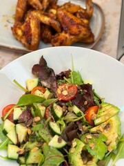 Fresh vegetable salad with a vibrant mix of greens, cherry tomatoes, cucumbers, and bell peppers. Crisp, colorful, and packed with vitamins, this salad makes a healthy, delicious meal or side.
