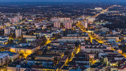 Tarnow illuminated old town townscape, aerial drone view, Poland.