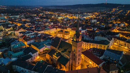 Obraz premium Tarnow illuminated old town townscape, aerial drone view, Poland.