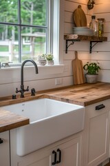 A close-up of a cozy kitchen with a farmhouse sink and wooden countertops