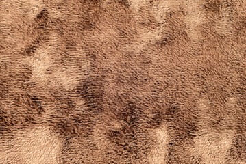 Texture of dense brown fabric for tailoring. Canvas. Textile. Material. Velour