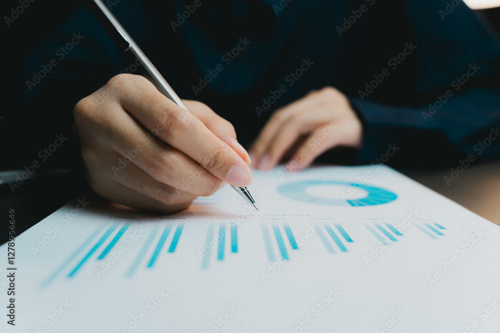Poster business professional analyzing data with pen and chart on table